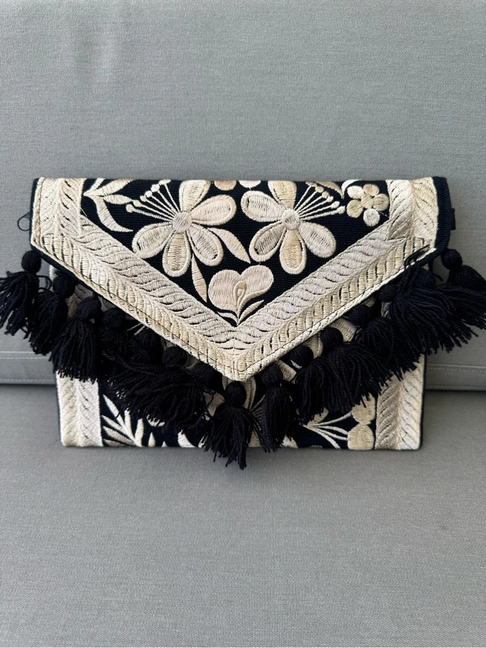 Handmade Mexican Embroidered Clutch Purse | Black & Ivory Tassel Crossbody - Picture 4 of 9